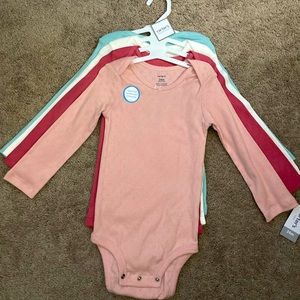 Carters size 24 months long sleeve onesies set of 4